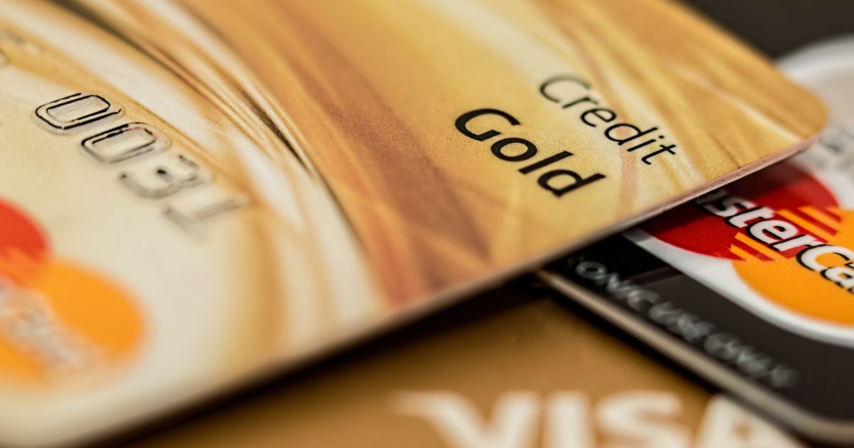 A stack of credit cards on a table